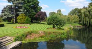 Lawns and river at the nearby French Horn in Sonning.jpg